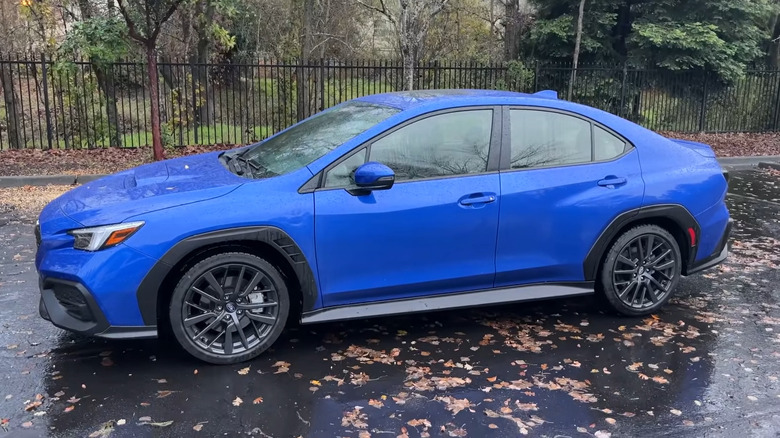 2022 Subaru WRX on quiet rainy road