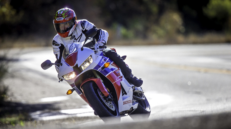 A 2013 Honda CBR600RR being ridden in a canyon