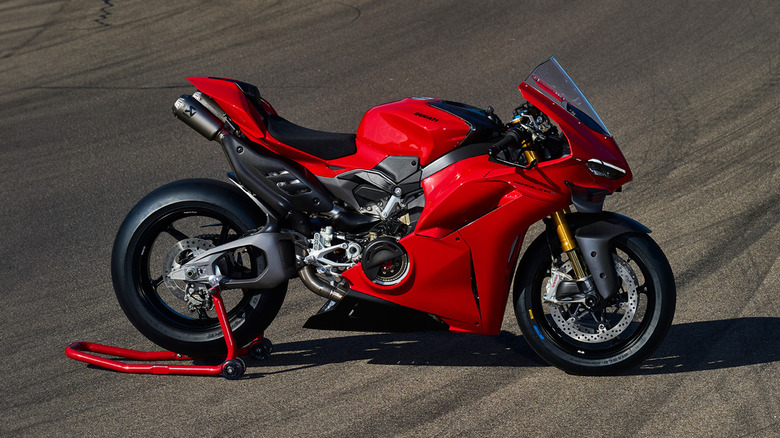 An orange Ducati Panigale V4 S with black trim