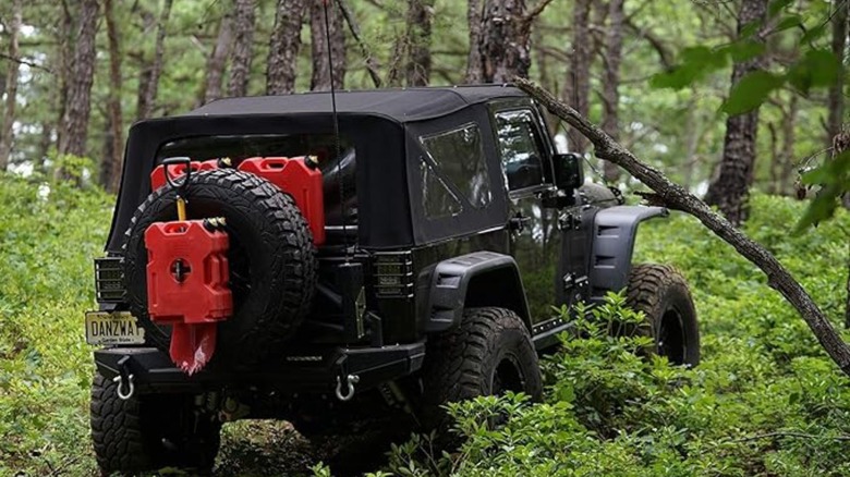 A Jeep driving with gasoline pack