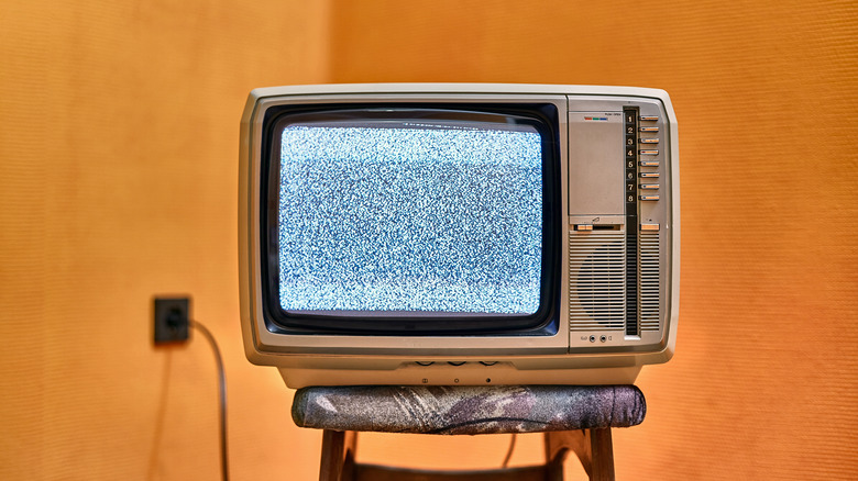 CRT TV on a stool