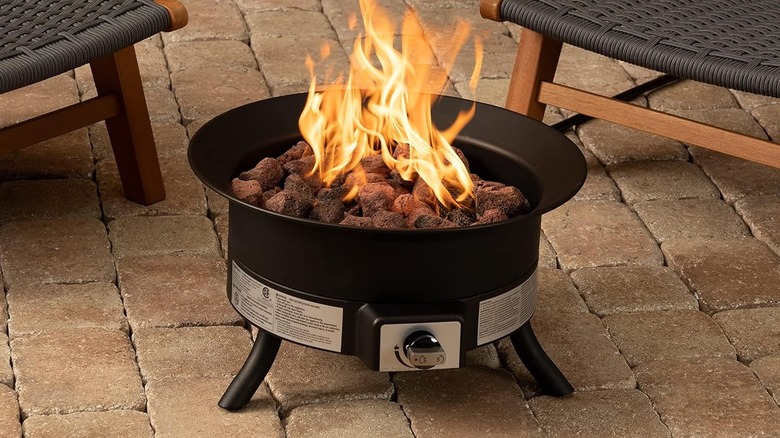 Amazon Basics Portable Propane Fire Pit on patio