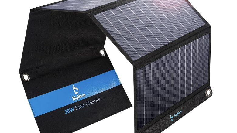 Partially opened BigBlue solar panel charger with 3 USB ports