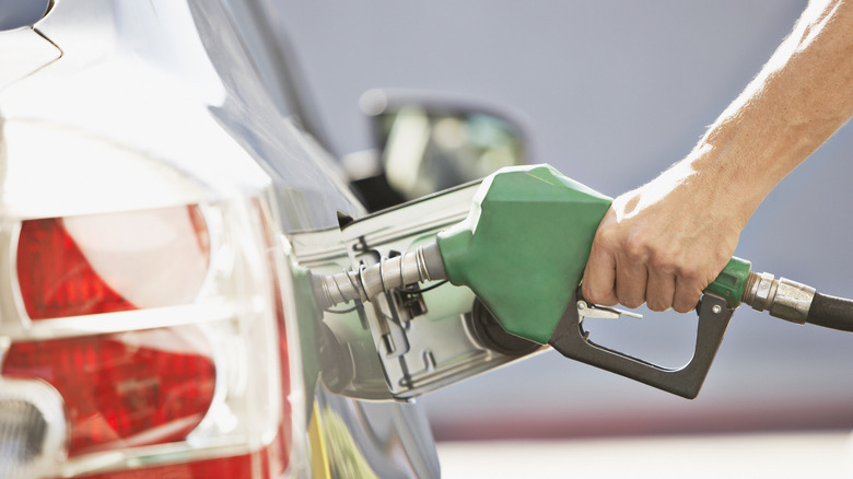 Man pumping gas