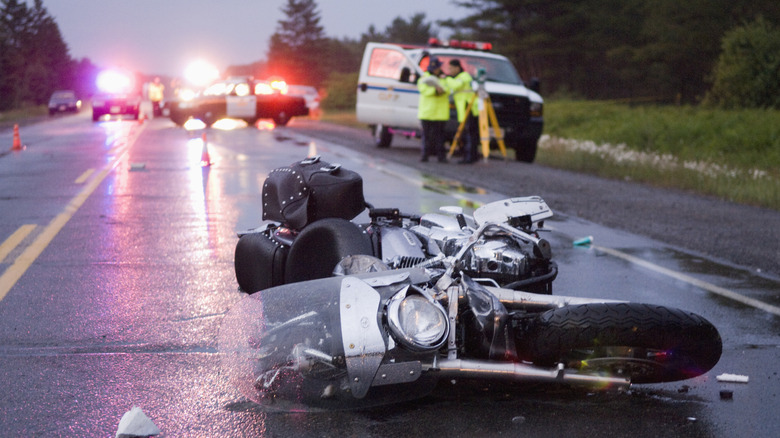 Crashed motorcycle on road