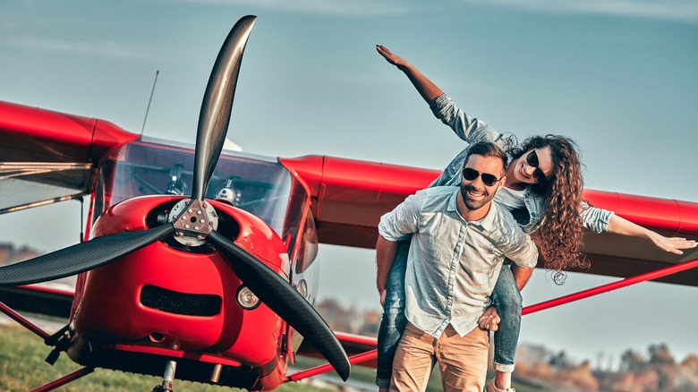 Couple with airplane