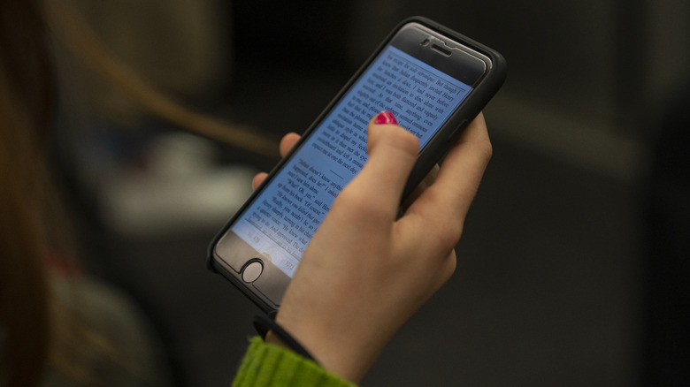 Woman reading phone