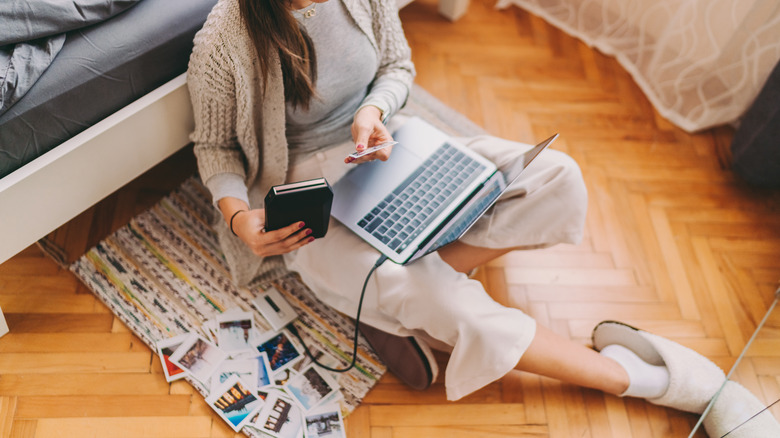 Woman printing photos from computer