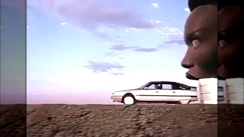 Citroen car exits mouth of giant Grace Jones head