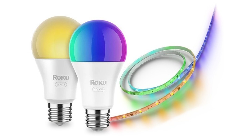 two Roku smart light bulbs with light strip on white background