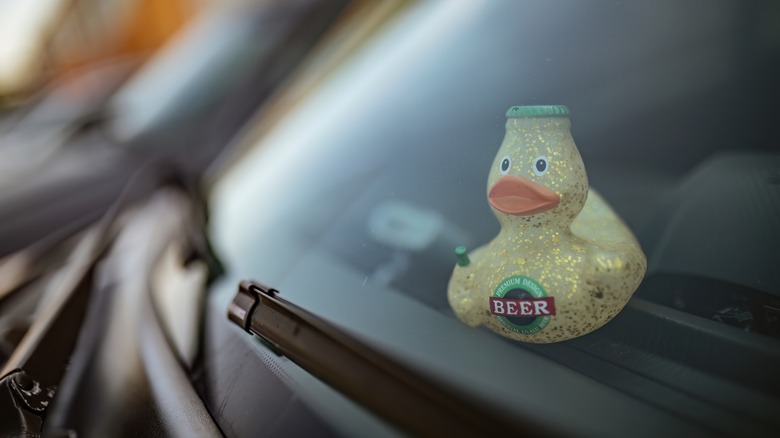 Sparkly duck on dashboard