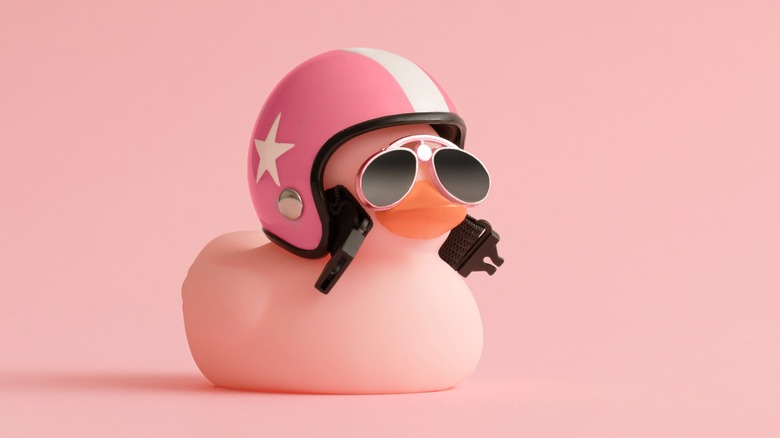 Rubber duck with racing helmet and sunglasses