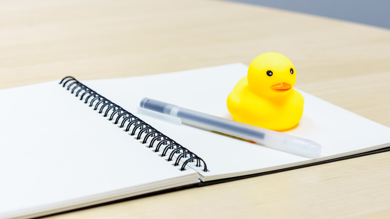 Rubber duck on notebook