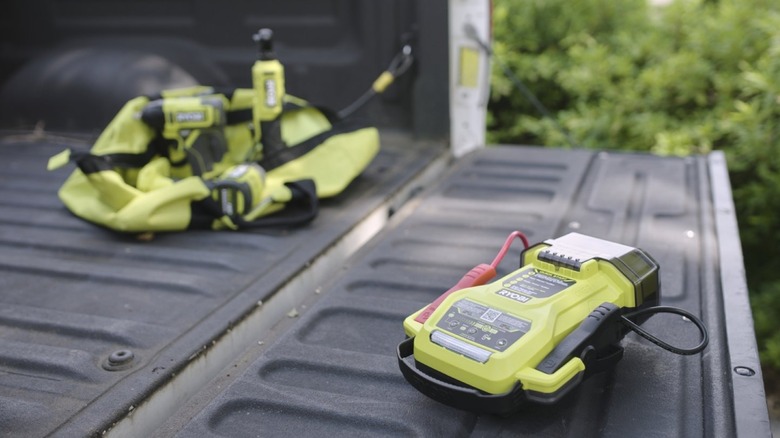 jump starter sitting on truck tailgate