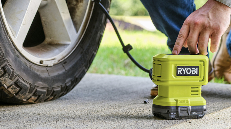 Ryobi 18V One+ High Pressure Digital Inflator filling a tire