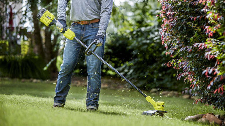 Man using string trimmer