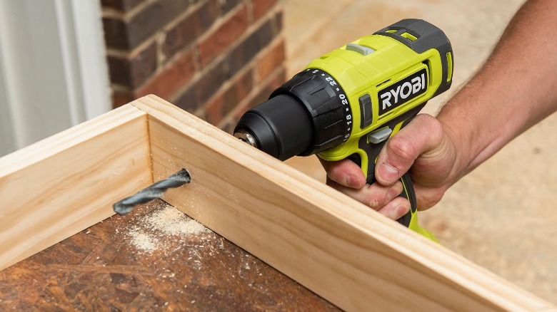 Person using a Ryobi 18V One+ ½-inch Drill/Driver Kit