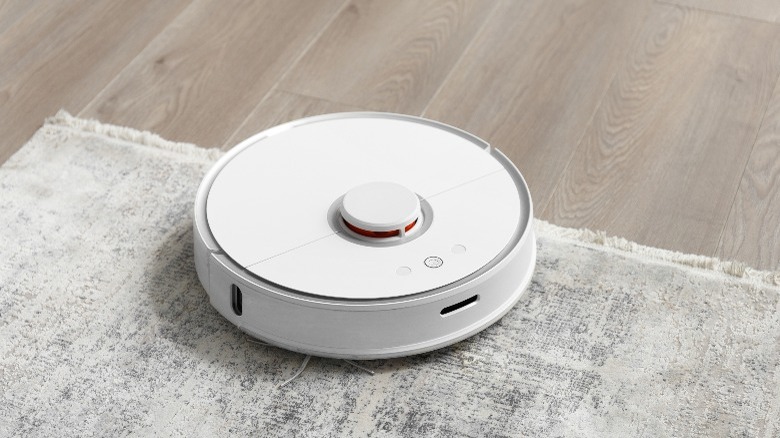 Robot vacuum on a carpet