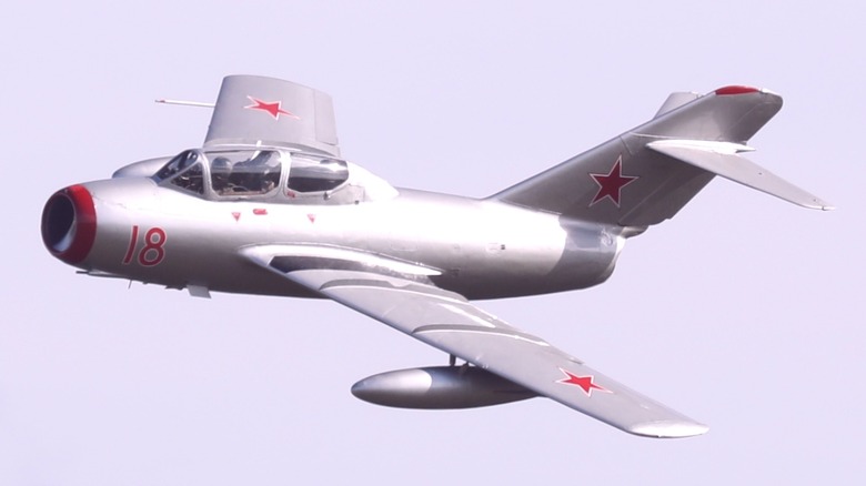 MiG-15 flying gray sky