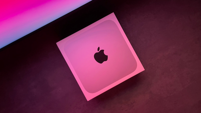 An Apple Mac Mini in its box.