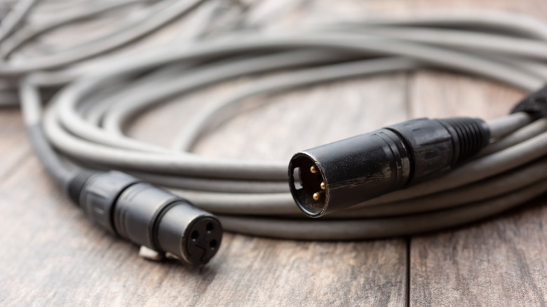 close up of XLR on wooden table