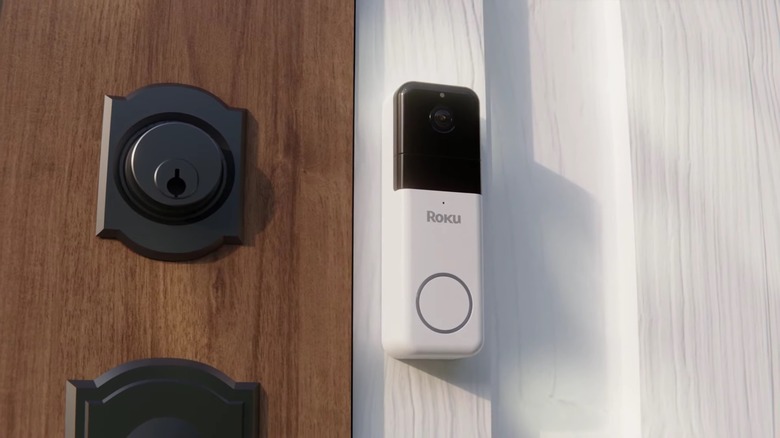 Installed Roku wireless doorbell next to a door