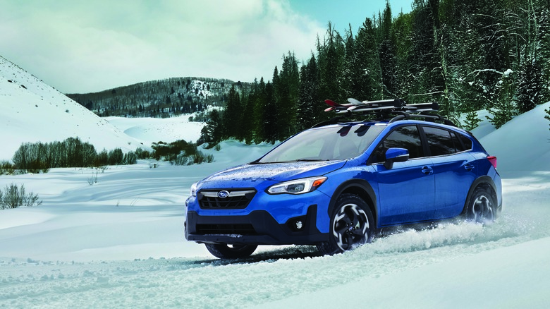 2021 Subaru Crosstrek driving through snow