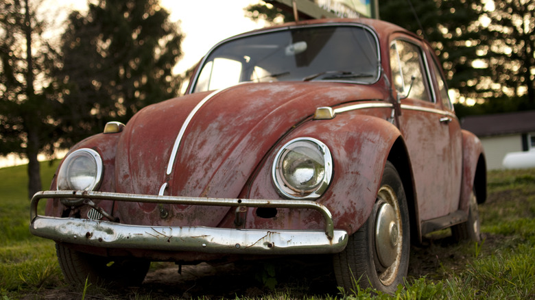 rusty red VW Beetle