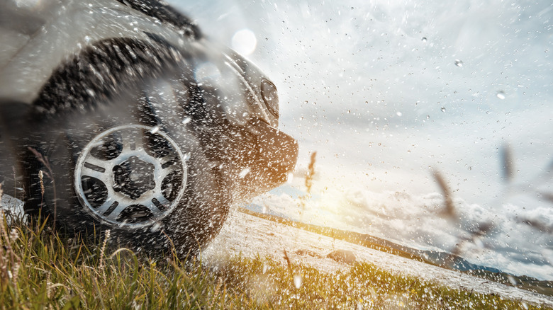 truck off roading rain