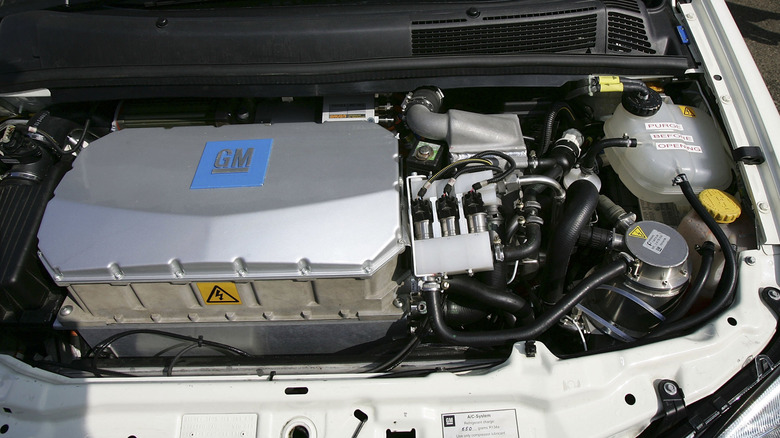 An engine in a car with the GM logo