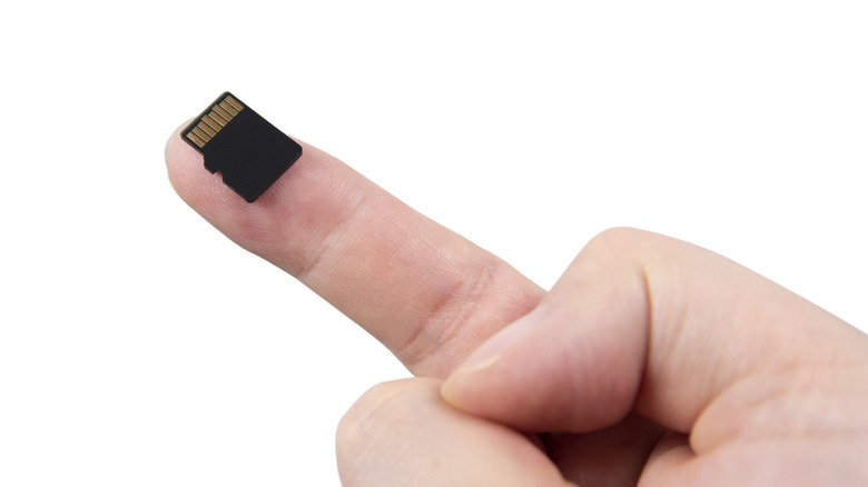 MicroSD card on finger