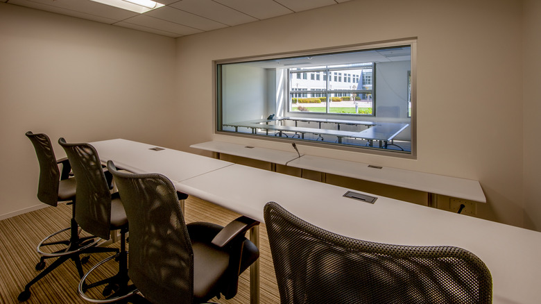 An observation room with a one way mirror