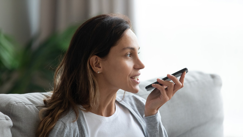 woman speaking to phone