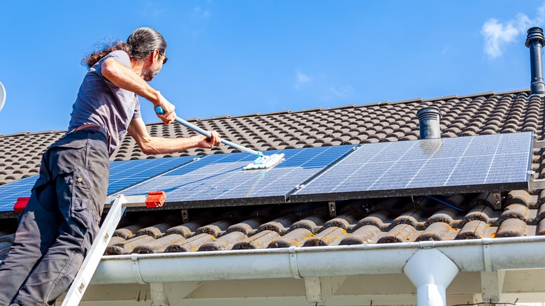 cleaning dust from solar panels