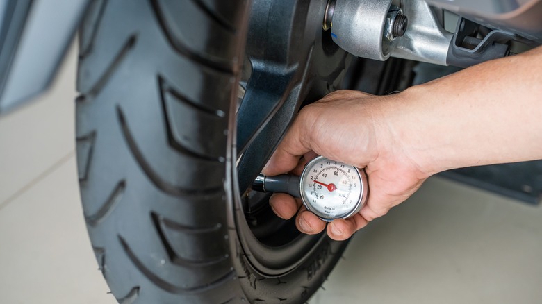 checking motorcycle tire pressure