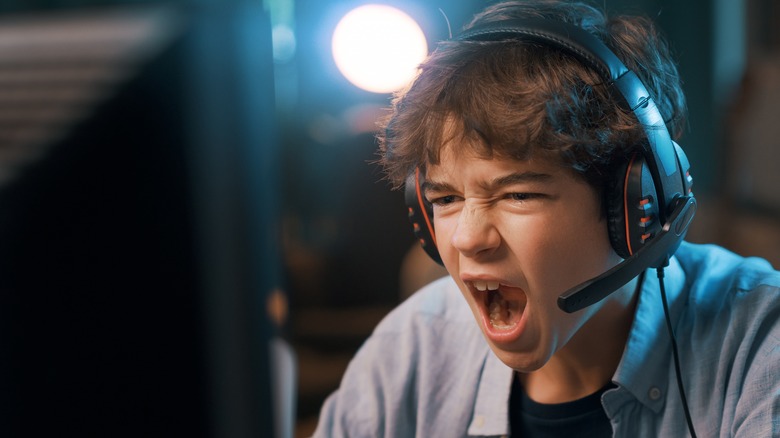 young gamer with headset