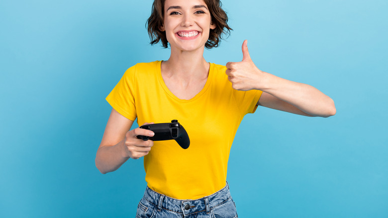 woman with gaming controller 