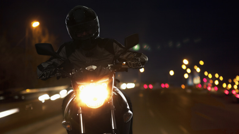 Motorcycle rider at night