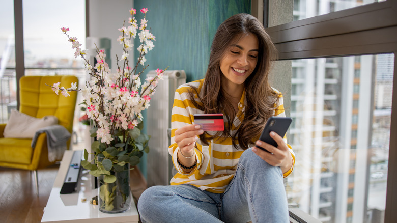 woman shopping on smartphone