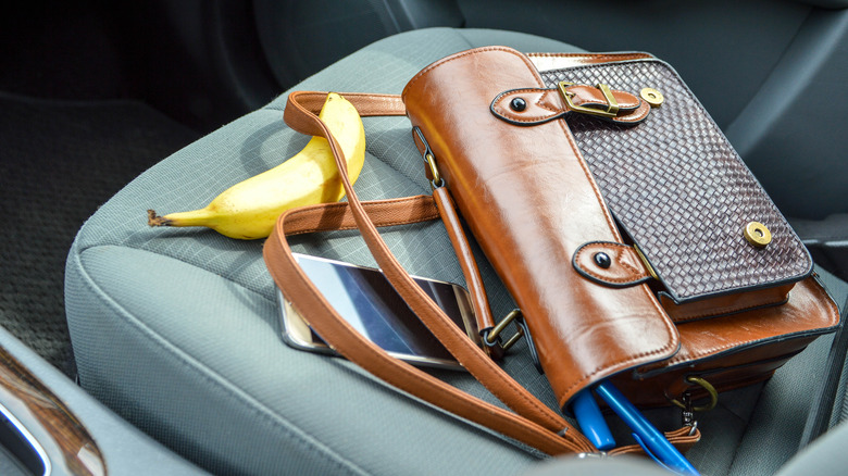 bag on passenger seat of car