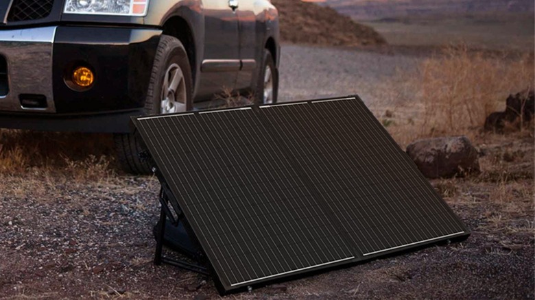 Foldable solar panel sitting on the ground