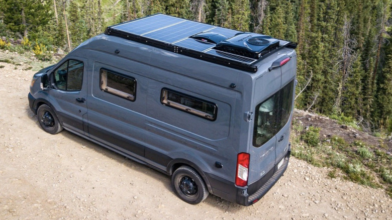 Solar panels bolted to the roof of a van