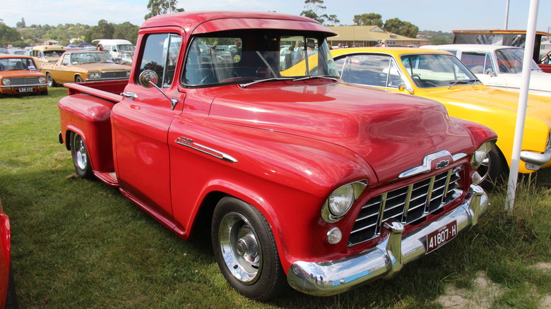 Chevy Cameo parked in grass 