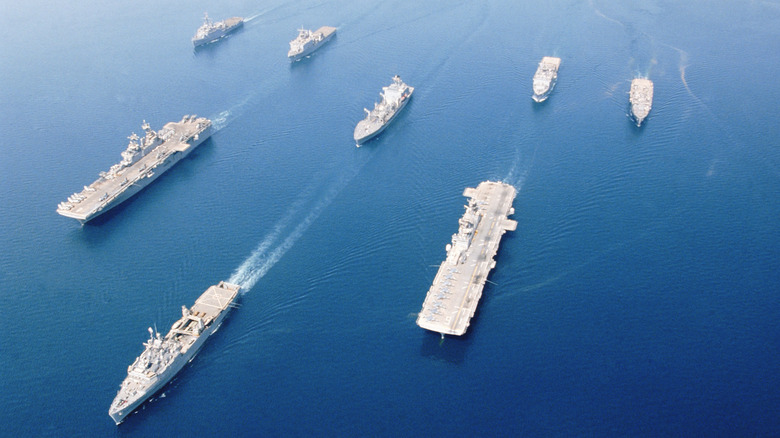 Fleet of U.S. Navy vessels, including 2 aircraft carriers, at sea