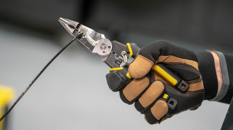 Hand holding multi-tool