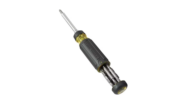 Klien ratcheting screwdriver with ejected storage compartment on a white background