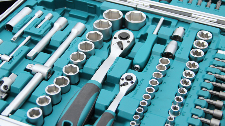 Tools in blue Makita toolbox