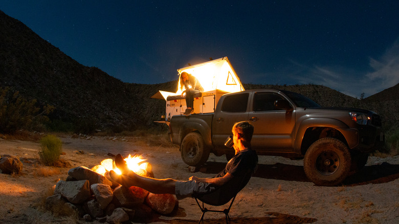 People camping with pickup truck