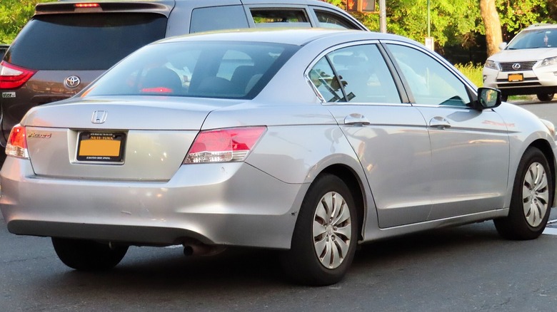 Silver 2010 Honda Accord in parking lot