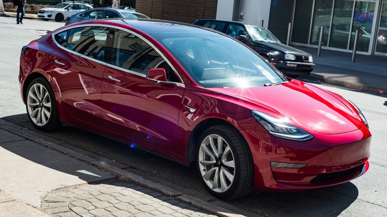 a red 2019 Tesla Model 3